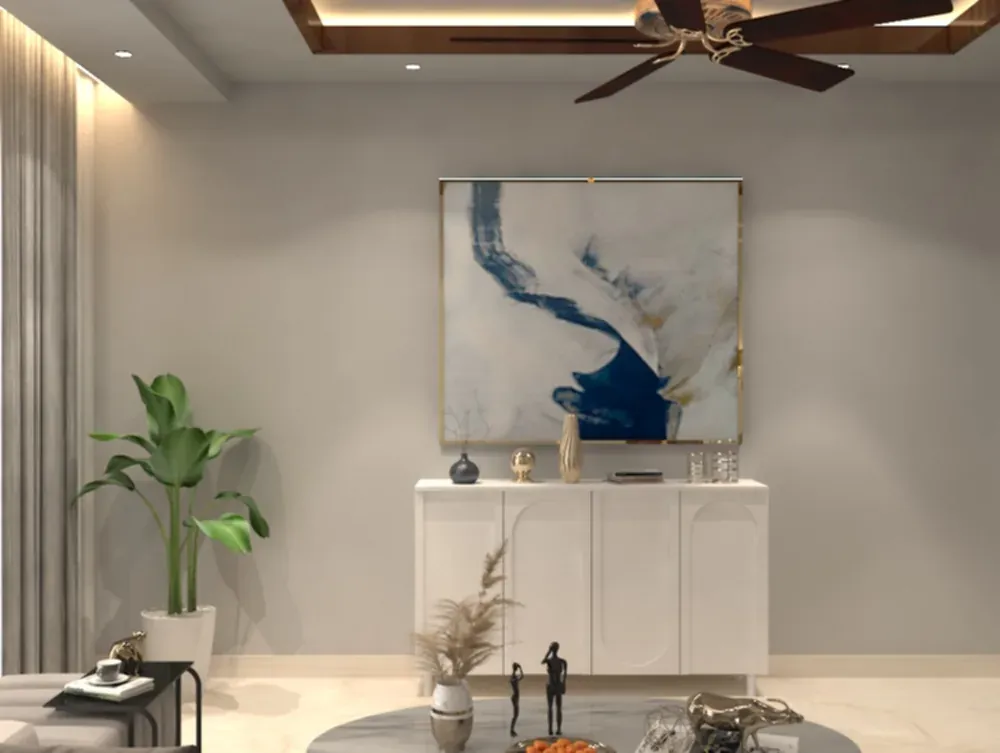 White console unit under a large abstract artwork, styled with a plant and sculptures