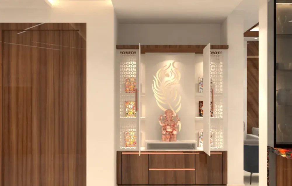 Wall-mounted pooja unit with backlit jali doors, glass shelves and wooden storage drawers